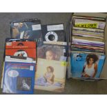 Approximately 100 45rpm singles from 1970's and 1980's including Eric Clapton, Madonna, Cher,