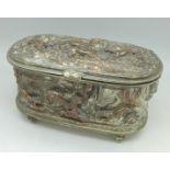 A French 19th Century silver on copper silk lined box decorated in relief with stag hunting scenes,