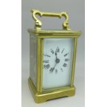 A French brass four glass sided carriage clock, height 11.