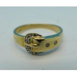 A 9ct gold and diamond buckle ring, 2.
