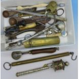 A collection of 19th Century and later implements including cigar cutter, apple corer,