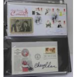 An album of signed First Day Covers including Chevy Chase, Ben Kingsley, Derek Jacobi, Richard Todd,