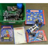 A collection of Meccano with two boxes,