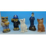 Two Beswick cats, a novelty salt and pepper and a figure of a policeman,