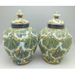A pair of lidded Majorca vases, lids a/f,