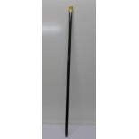 A 9ct gold mounted and ivory topped ebonised walking cane,