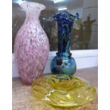 Three pieces of coloured glass,