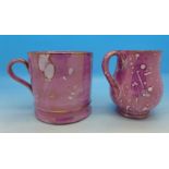 A pink lustre mug and cream jug