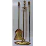 A brass companion set