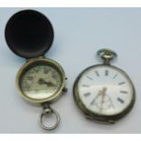 A continental silver pocket watch and a pocket compass
