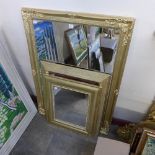 Three gilt framed mirrors