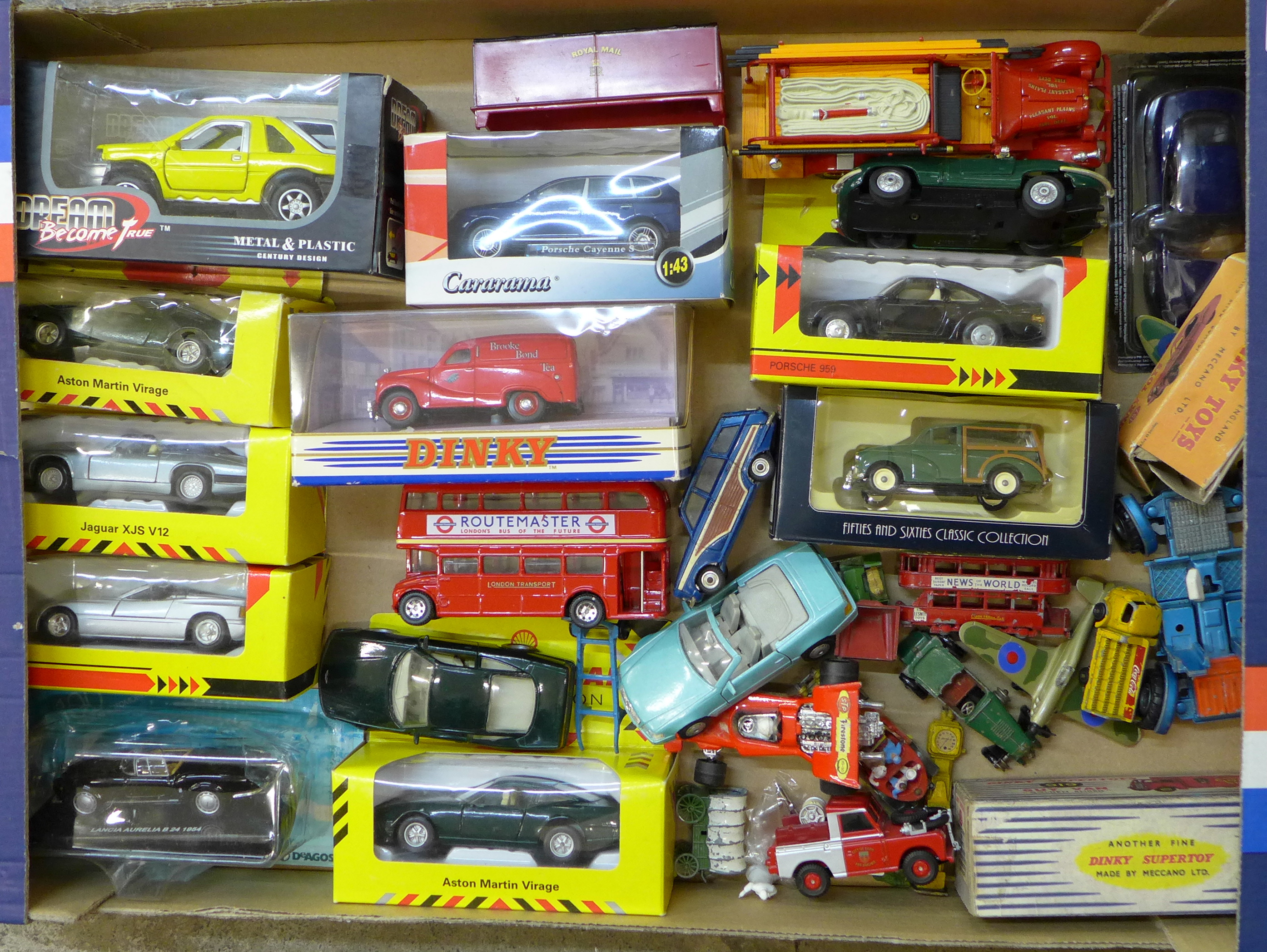 A box of die-cast cars including Dinky, some boxed