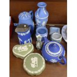Wedgwood Jasperware including urn, vase, two tea pots and jug, (7),