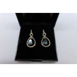 A pair of silver and blue quartz earrings