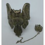 A metal owl bangle and ring