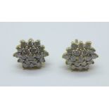 A pair of 18ct gold and diamond cluster earrings, 3.