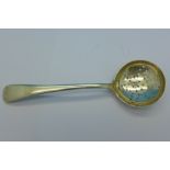 A silver sifter spoon, by Walker & Hall,