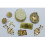 A plated locket, a Victorian brooch, cameo brooch, etc.