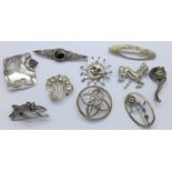 Ten silver brooches