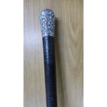 A heavy Indian white metal topped walking cane