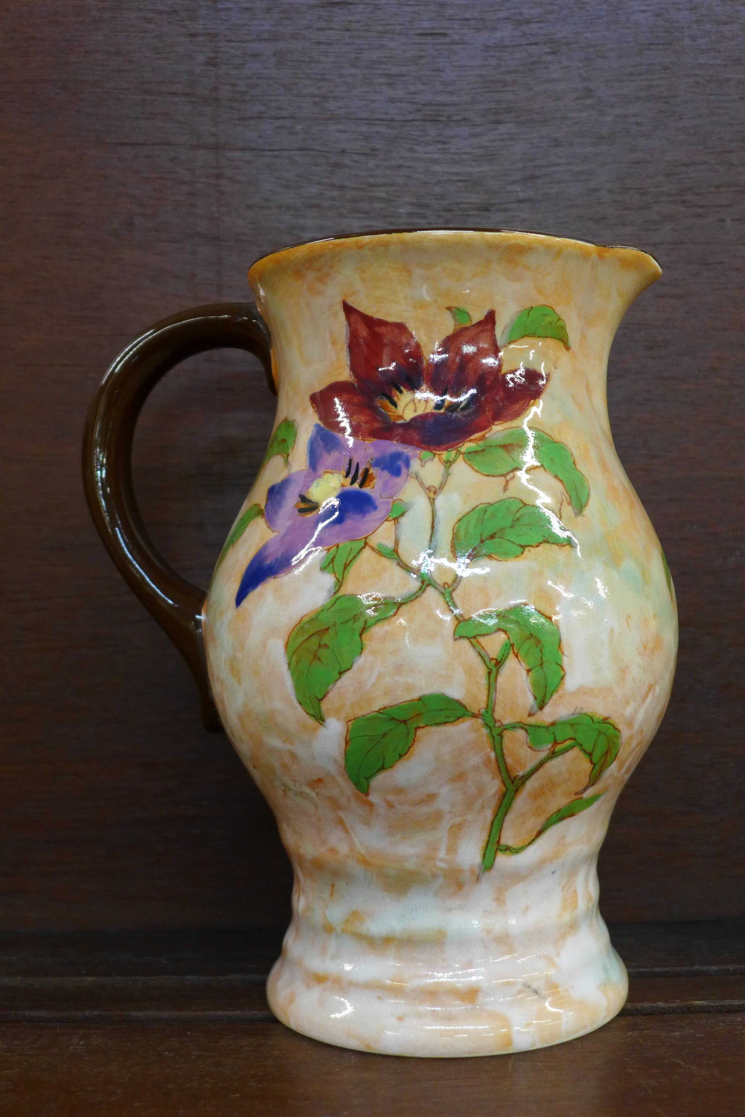 A Royal Doulton Magnella jug, 21.