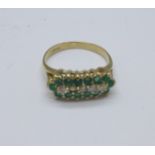 A 9ct gold, emerald and white stone ring, 2.