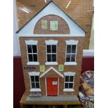 A doll's house/shop with furniture and accessories