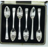 A cased set of six plated grapefruit spoons marked Elkington