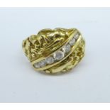 An 18ct gold and white stone ring, 7.