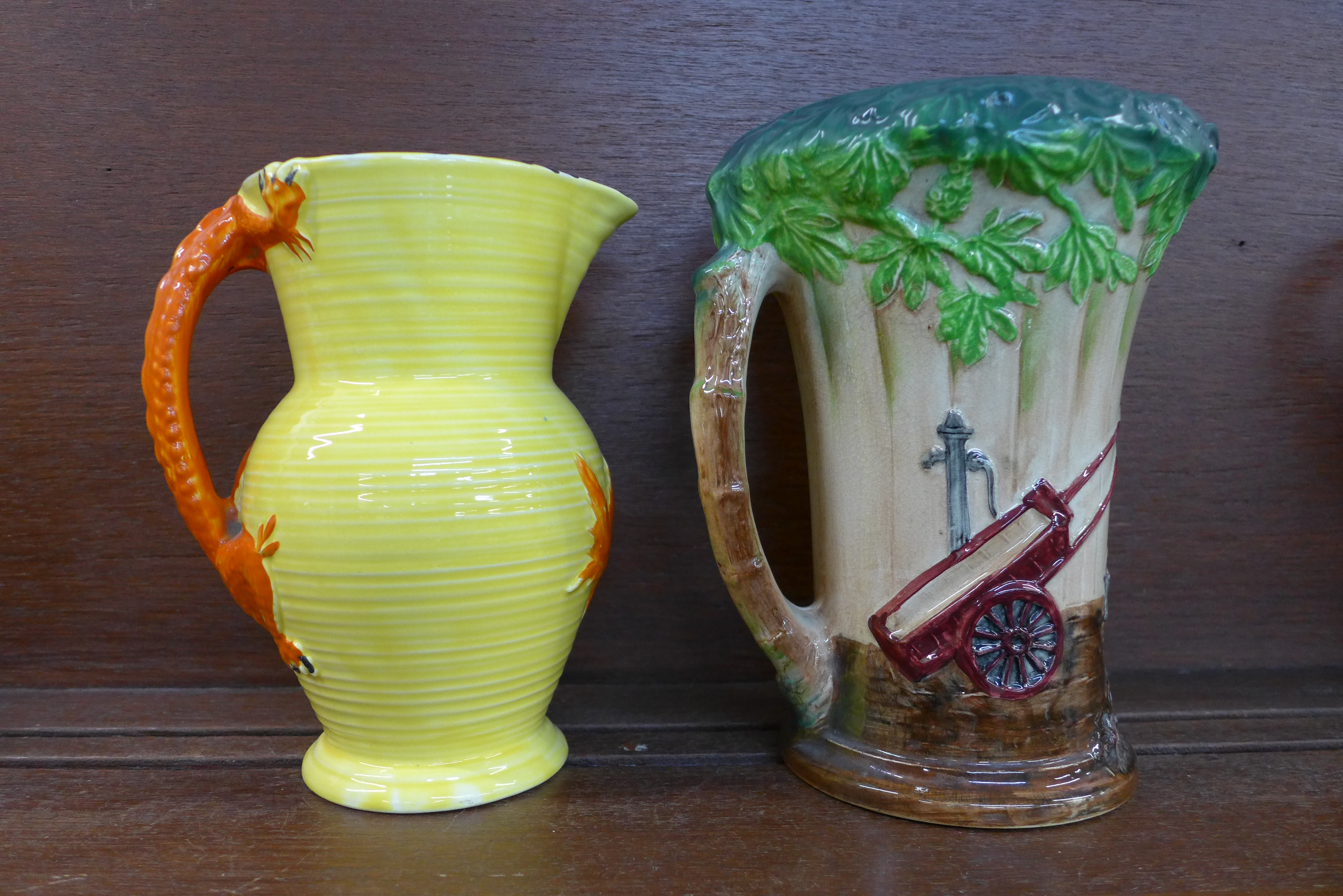 A Burleigh Ware dragon jug and a The Village Blacksmith jug, 19.5cm and 22. - Image 2 of 2