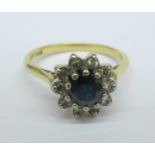 An 18ct gold, sapphire and diamond cluster ring, 3.