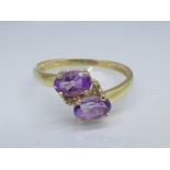 A 9ct gold, amethyst and diamond ring, 1g,