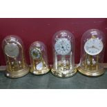 Four anniversary clocks including Kundo,