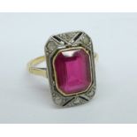 An Art Deco, yellow and white metal set rose cut diamond and red stone ring, 4.