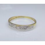 A 9ct gold and diamond ring, 0.