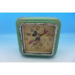 A tin-plate Ingersoll Mickey Mouse alarm clock,