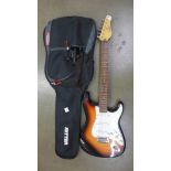 An Encore electric guitar with soft case