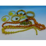 Two bead necklaces, five bangles,