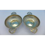 Two pierced silver dishes,