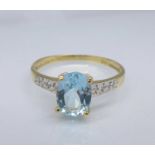 A 9ct gold, topaz and diamond ring, 1.