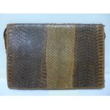 A crocodile skin bag,