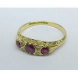 An 18ct gold, ruby and diamond ring, 3.