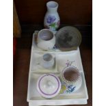 Poole ware; four vases, a jam pot and lid, a small plate and divided serving dish,