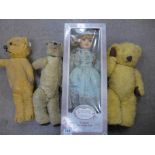 A Merrythought vintage Teddy bear, two other Teddy bears, and a porcelain doll,
