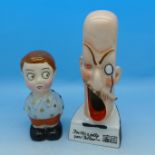 A German comic ash bowl or pot and Birks Rawlings Kewpie figure