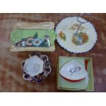 A Wileman daisy shape cup and saucer, an Anemone dish, Carlton ware butter dish and knife, boxed,