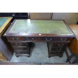 A mahogany pedestal desk