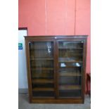 A Victorian style mahogany two door bookcase