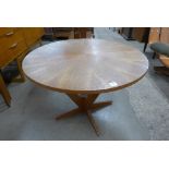 A Danish teak circular coffee table