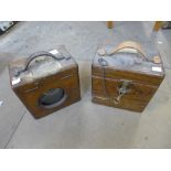 A pair of early 20th Century oak pigeon racing clocks